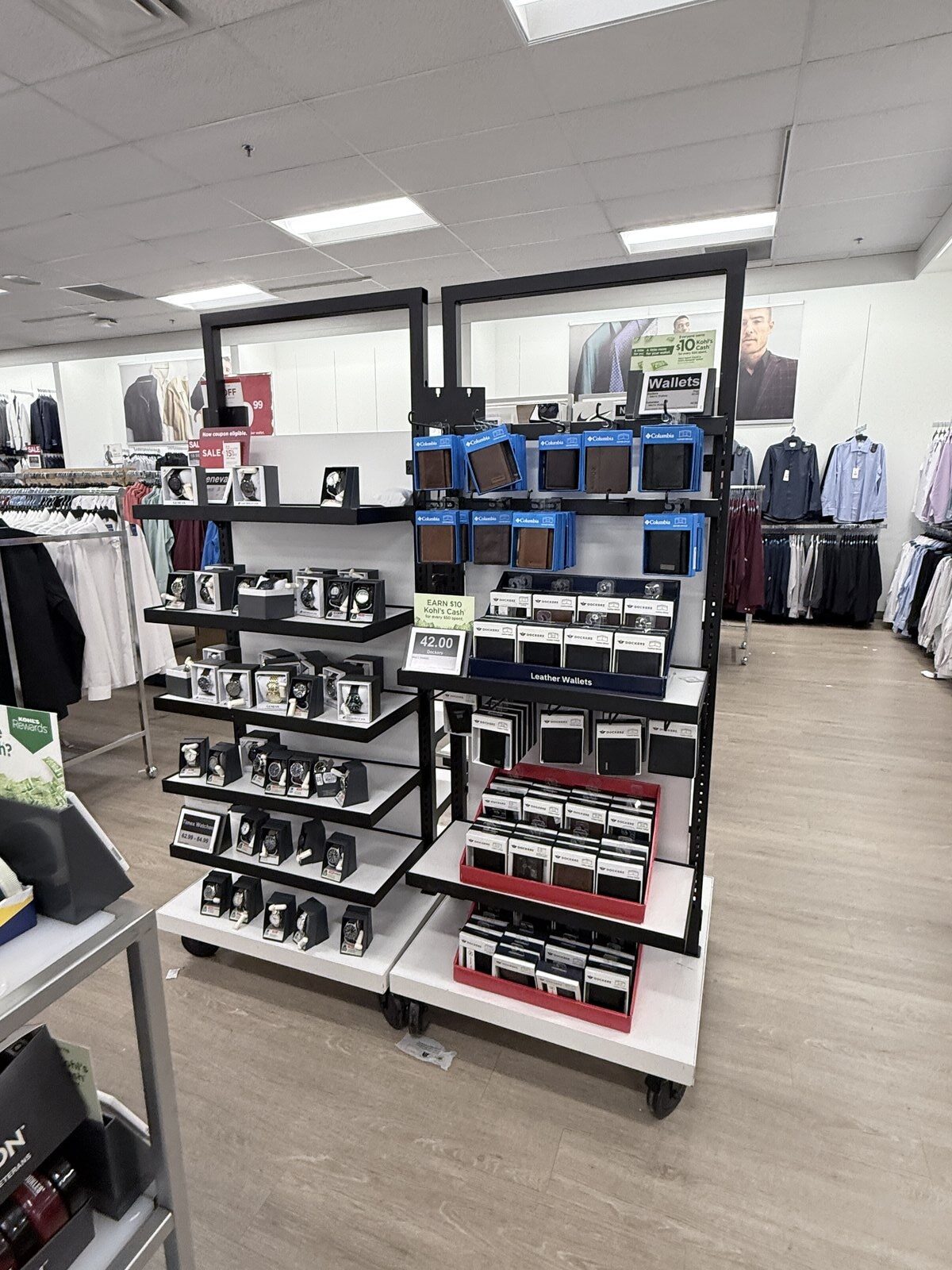 Current wallet fixture at retail, product in closed boxes